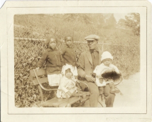 My Grandfather William Palmer with some of his children. My Dad is not in this photo since he was born in 1930 and the photo taken in 1926.